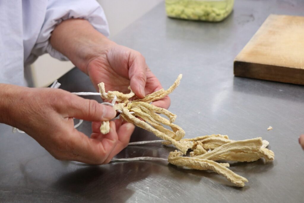 Chie preparing food in the kitchen