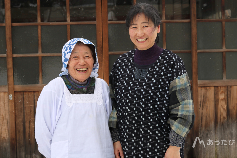 Chie and Takahashi standing together