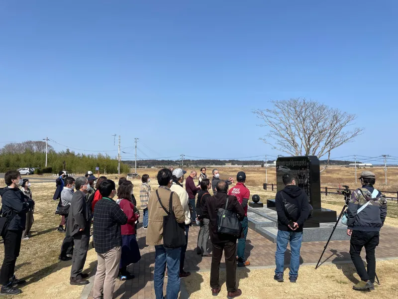 Visitors learning about Namie and sake brewing experiences