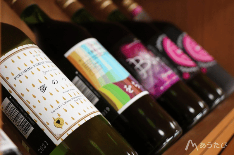 Various types of wine displayed inside a Japanese winery