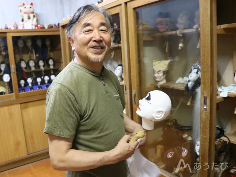 Koryu smiling casually in a T-shirt