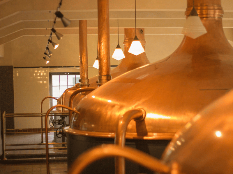 Rows of beer tanks in a factory
