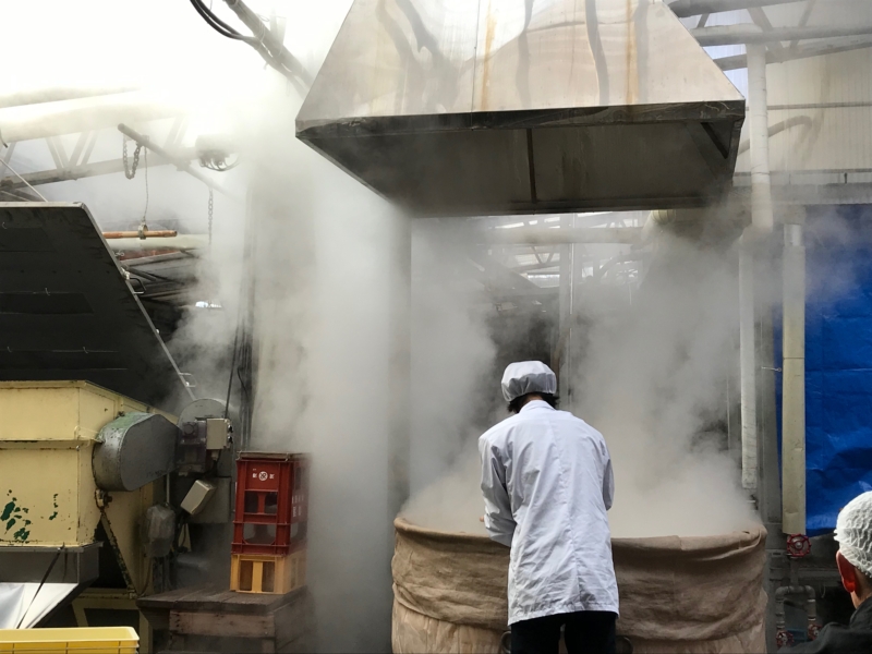 Toji (master brewer) working in the brewery