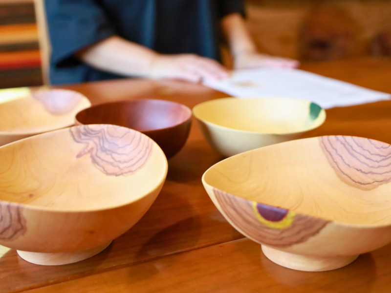 Wooden bowl repaired with washi paper creating unique design