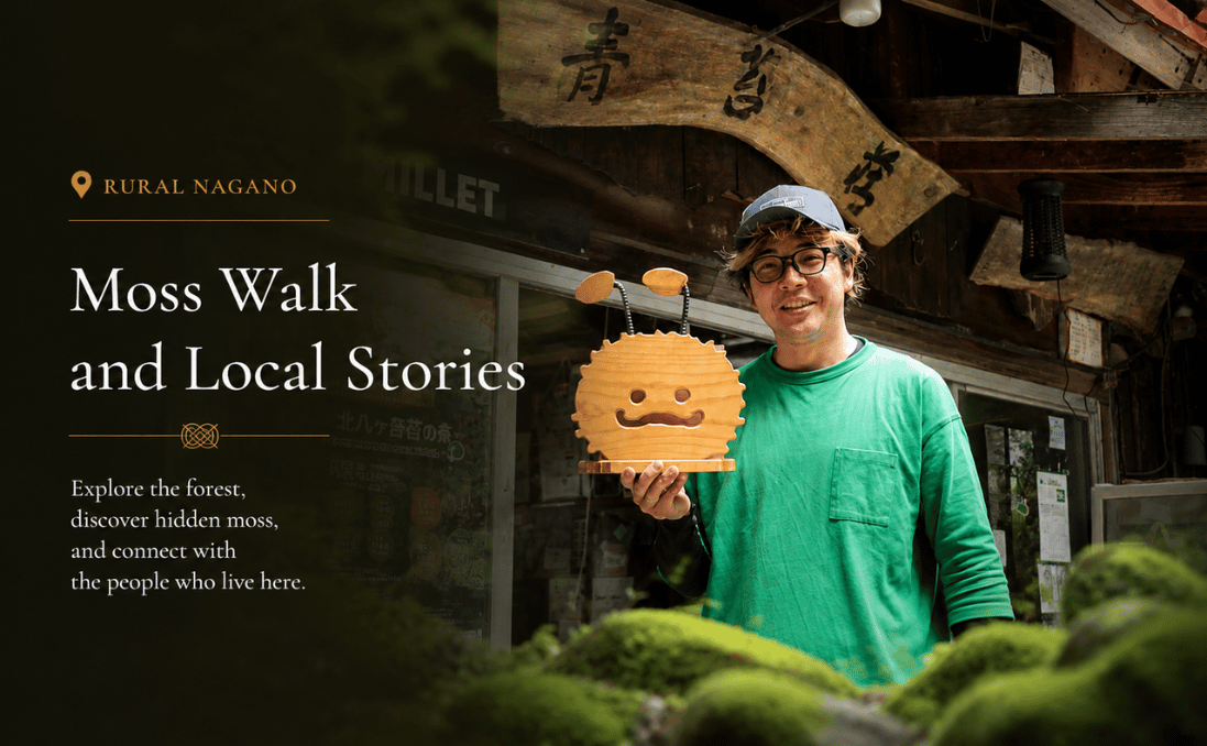 Local moss guide smiling while holding a moss-themed doll